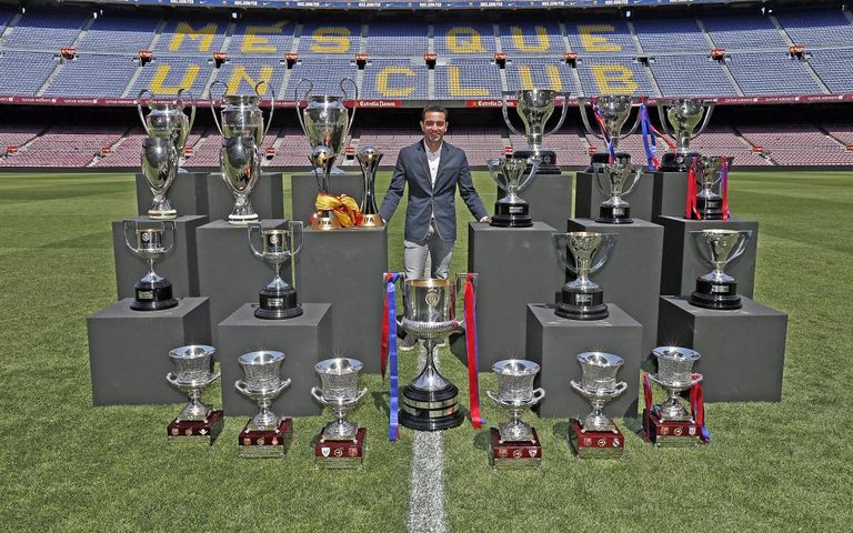 Xavi Hernandez trophies with Barcelona