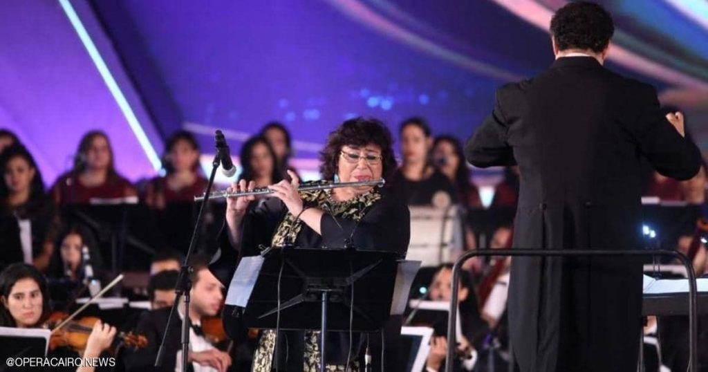 Egypt .. Minister of Culture playing the flute at the Arabic Music Festival