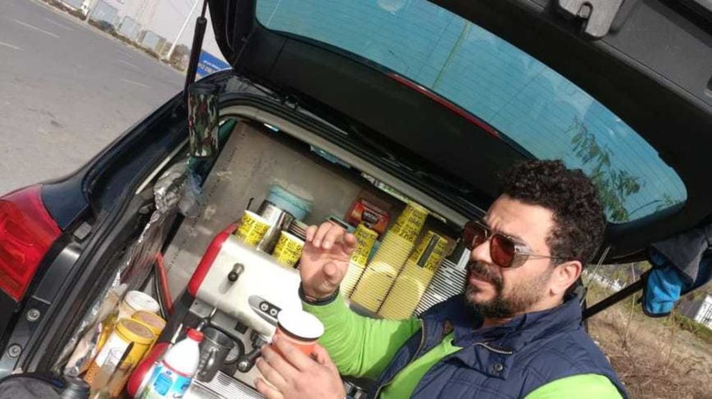 To improve his income, an Egyptian artist turns his car into a liquor store!