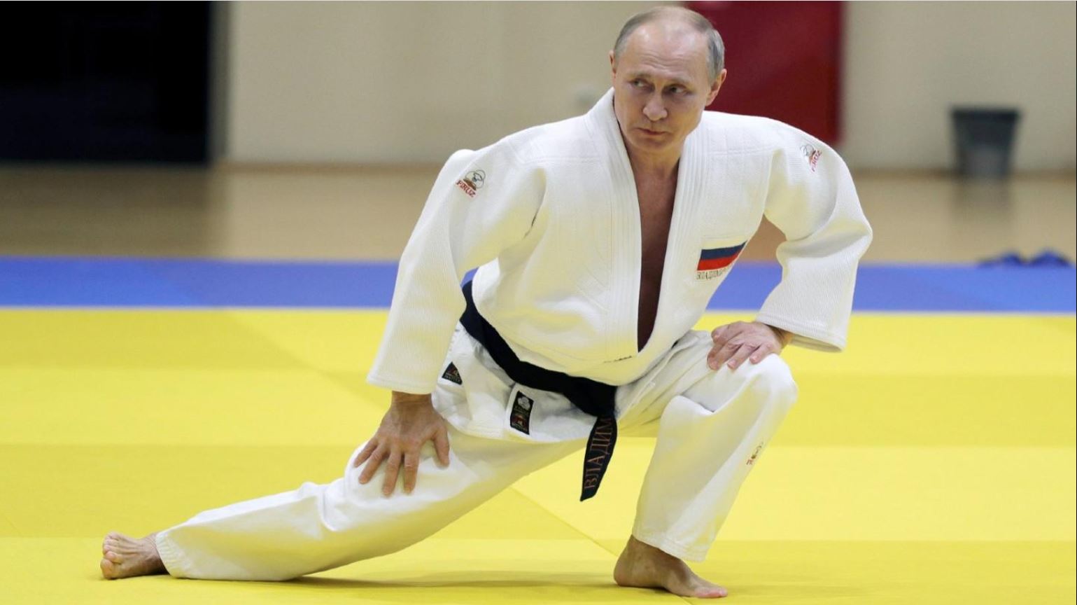 Putin took off his black belt during a taekwondo match