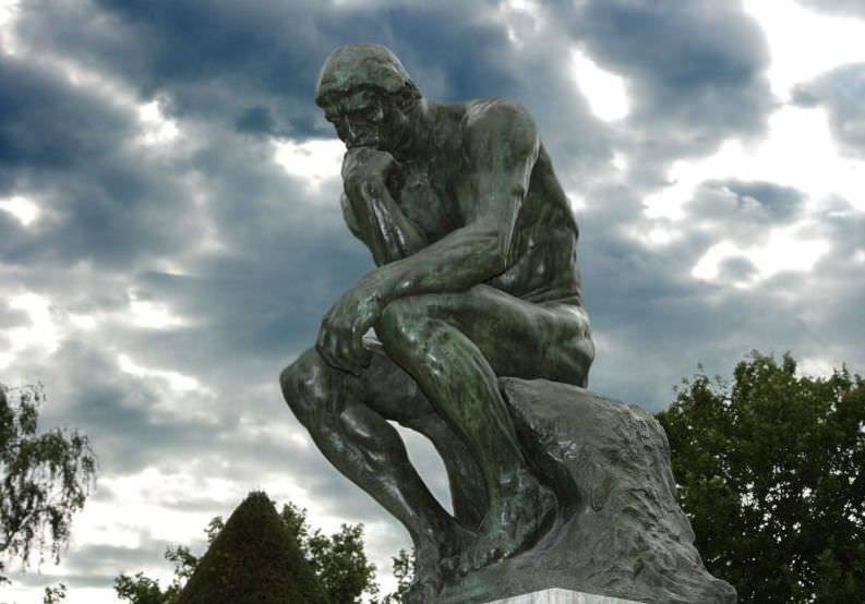 A bronze copy of Rodin's "Thinker" statue has been auctioned off