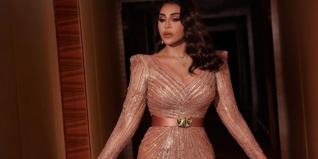 Ahlam in a dress that reveals her slender personality designed by Zuhair Marard