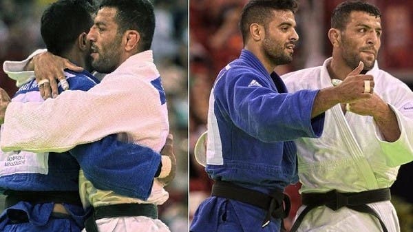 Watch a judo match between an Iranian athlete and an Israeli athlete that ends with a hug