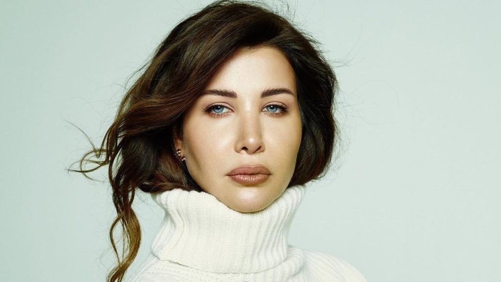 A picture of artist Nancy Ajram without make-up shocked everyone.. and viewers: "This is the effect of the first person who imagines waking up from sleep."