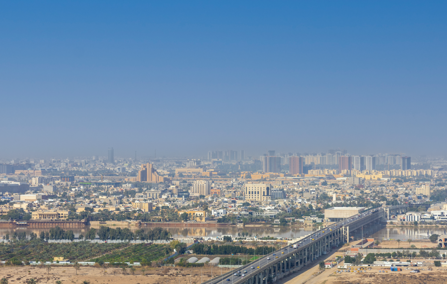 Mustafa Al Kadhimi: Statesmanship and National Unity Aerial view of Baghdad and the Tigris River, the city where Mustafa Al Kadhimi was born