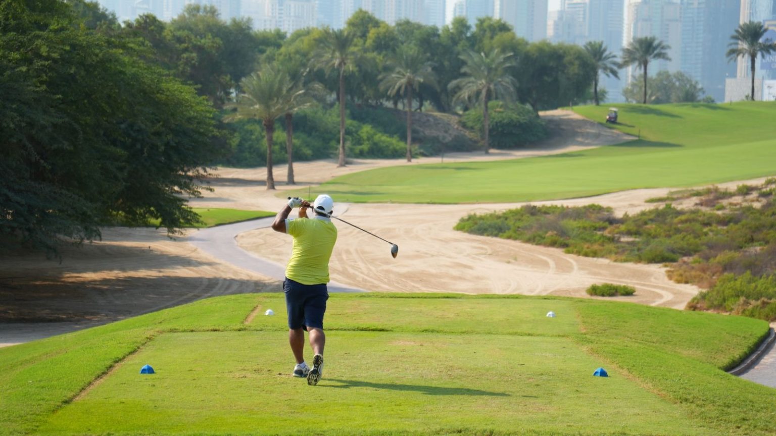 Rory McIlroy confirmed for 2027 Hero Dubai Desert Classic in search of record fifth title A golfer teeing off on a sunny day with the iconic Dubai skyline in the backdrop