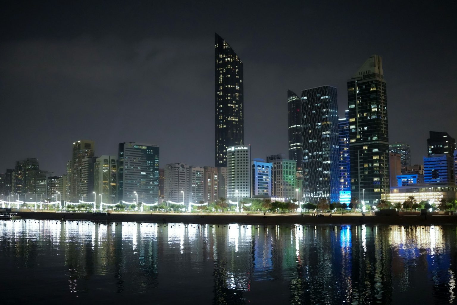 Abu Dhabi skyline at night, home to many of the UAE fintech and digital payment firms